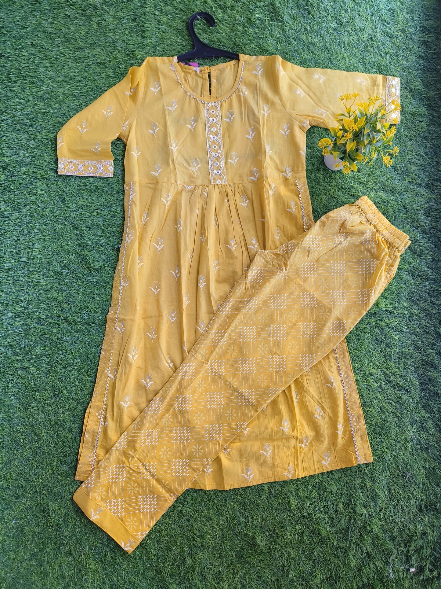 Simple Styled Printed Yellow Kurti and Plain Pant Outfit for Girl